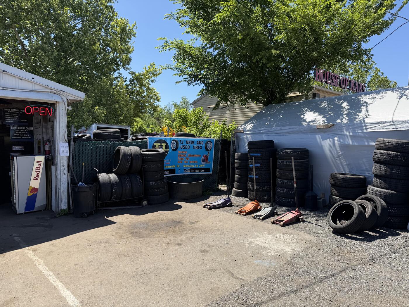 Exterior angle of TJ Jr with tire stacks lining the building