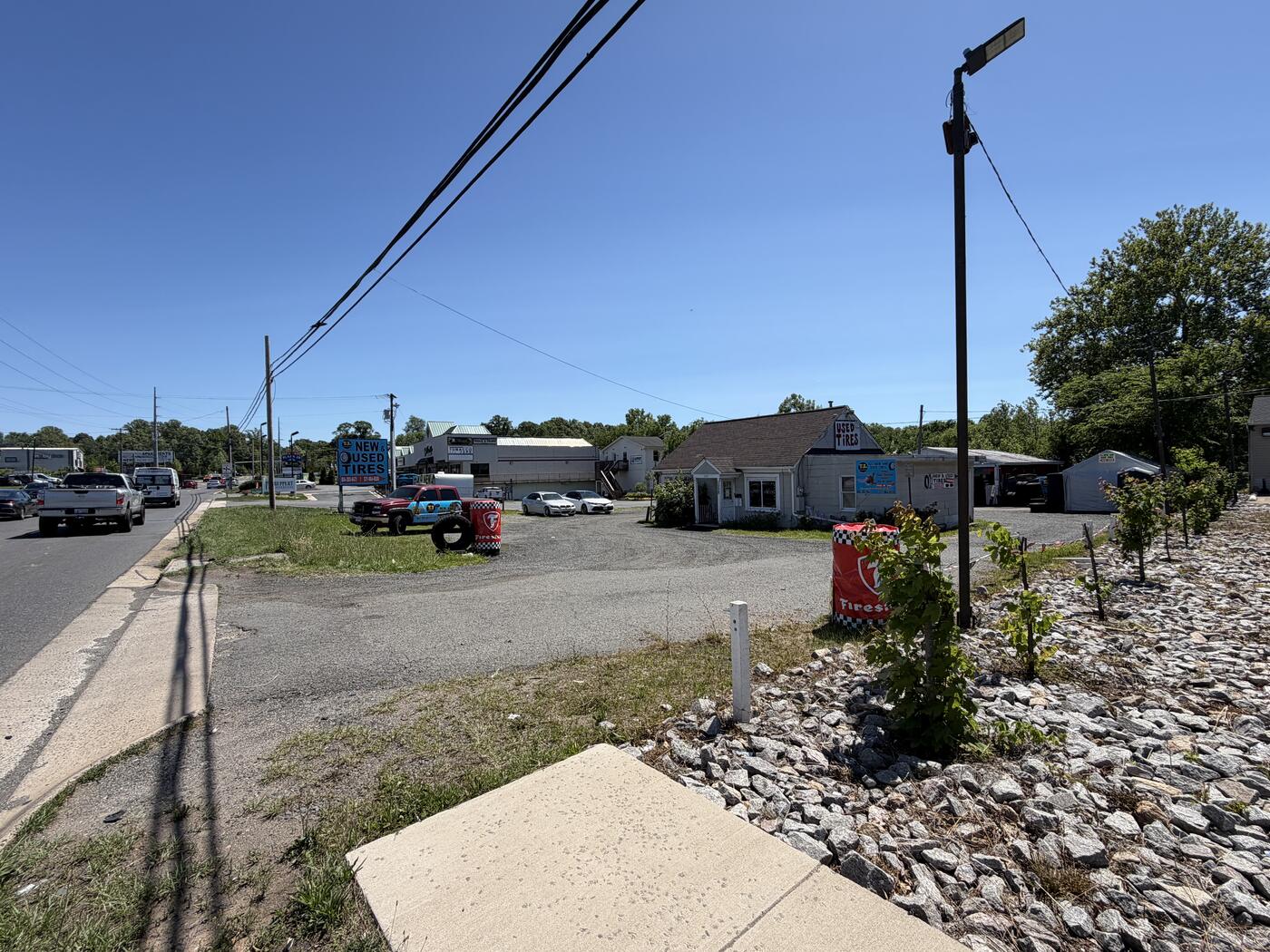TJ Jr seen from Centreville Rd in Manassas — the lot and shop from the street